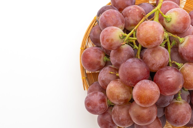 fresh grapes on white table