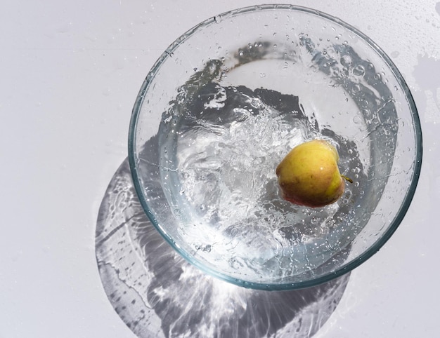 Fresh green apple in water