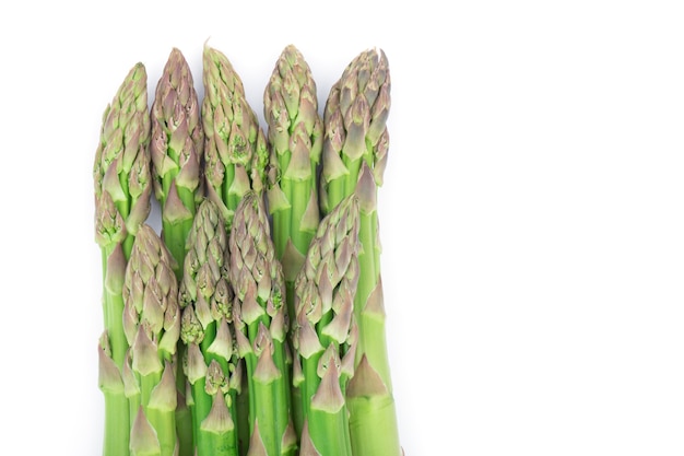 Fresh green asparagus closeup, isolated