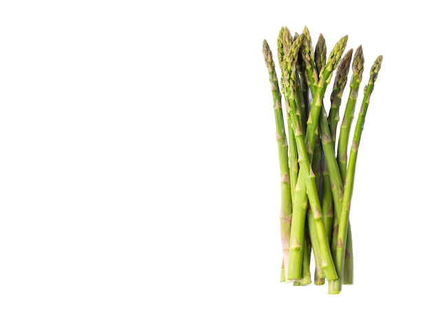 Fresh green asparagus isolated on white background