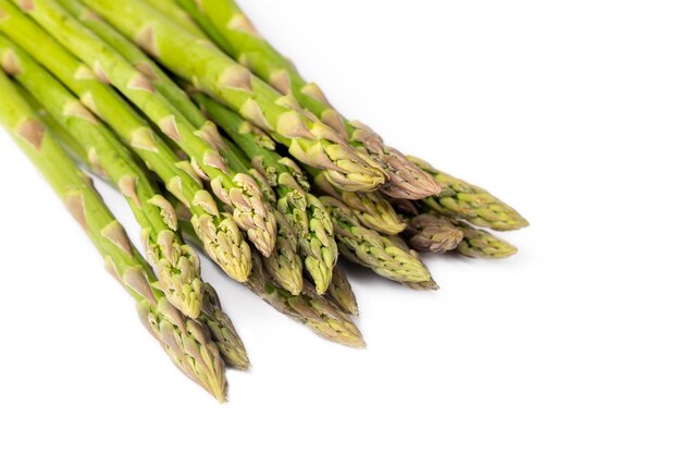 Fresh green asparagus isolated on white background