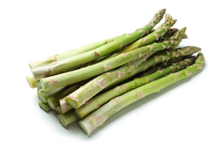 Fresh green asparagus isolated on white