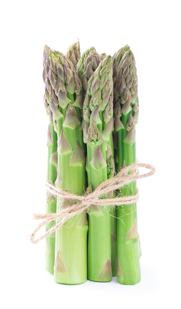 Fresh green asparagus on white