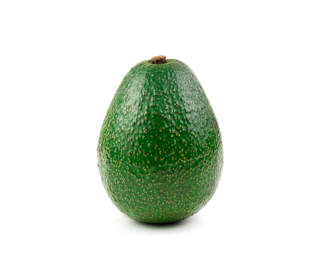 Fresh, green avocado in the skin on white