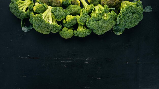 Fresh green broccoli Raw Vegetables On a wooden background Top view Copy space