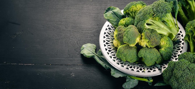Fresh green broccoli Raw Vegetables On a wooden background Top view Copy space