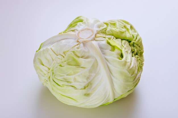 Fresh green cabbage isolated on white background. Close up.