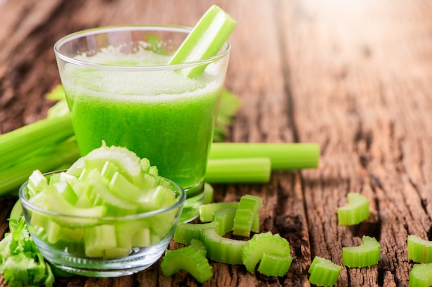 Fresh green celery juice in glass 