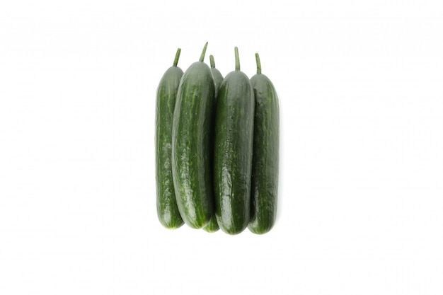 Fresh green cucumbers isolated on white surface
