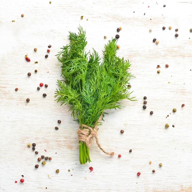 Fresh green dill on the table Top view