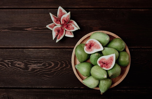 Fresh green figs top view on a wooden table