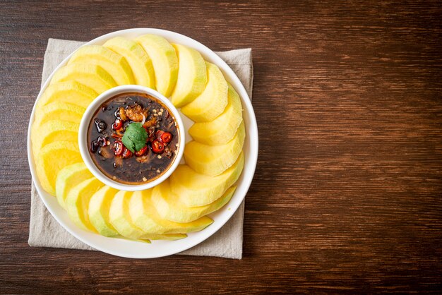 fresh green and golden mango with sweet fish sauce dipping - Asian style