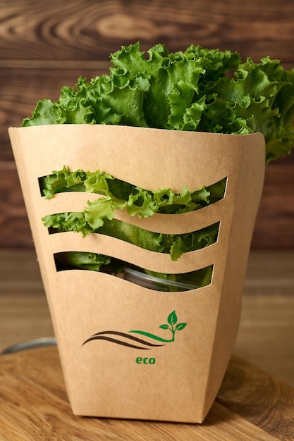 Fresh green lettuce in cartoon box