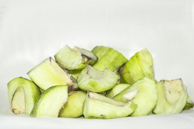 Fresh green mango fruit and leaf isolated on white background