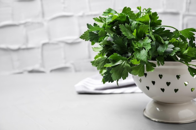 Fresh green parsley on table Space for text