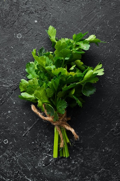 Fresh green parsley on the table. Top view.