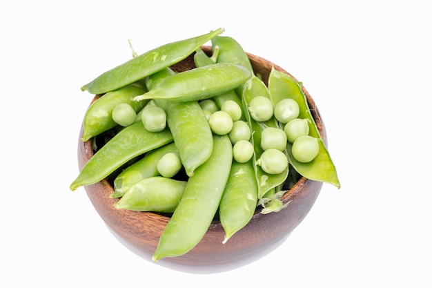 Fresh green pea vegetables on the white background