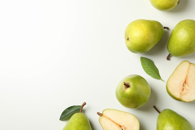 Fresh green pears on white