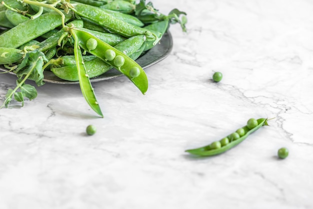 Fresh green peas ion table