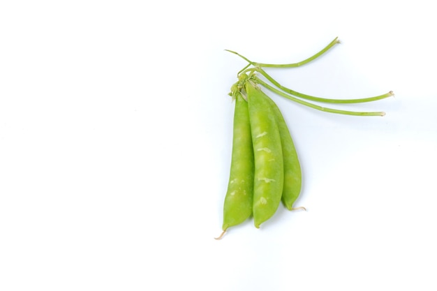 Fresh green peas isolated on a white background