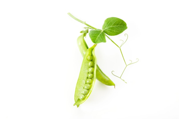 Fresh green peas isolated on white background