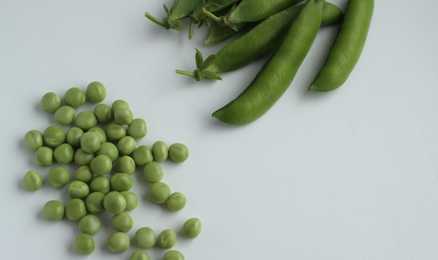 Fresh green peas in a pod and with peas