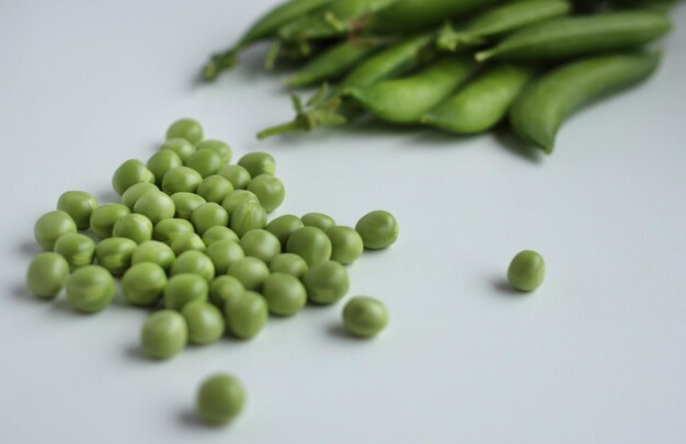 Fresh green peas in a pod and with peas