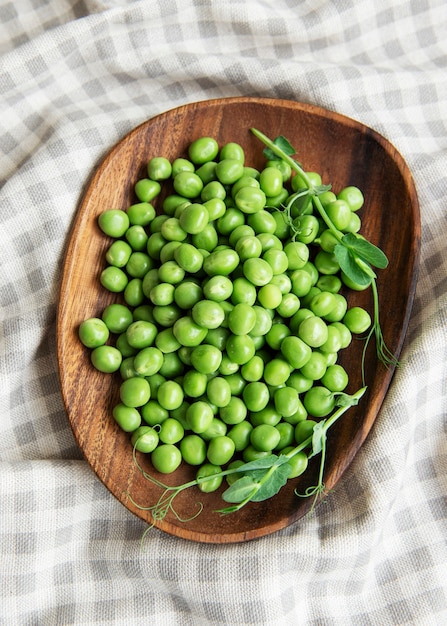 Fresh green peas pods and green peas