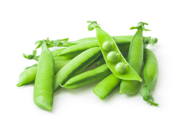 fresh green peas on a white .