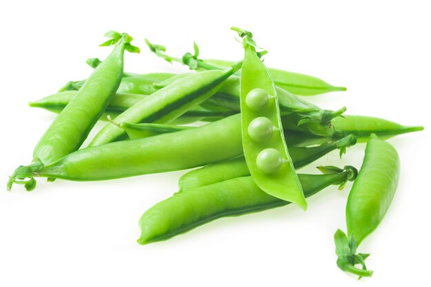 fresh green peas on a white .