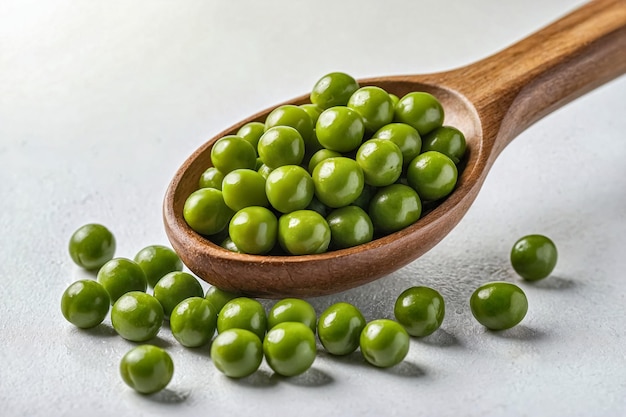 Fresh Green Peas in a Wooden Spoon