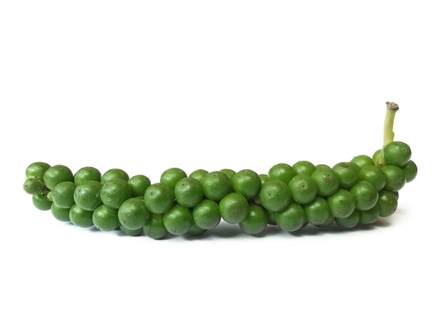 Fresh green peppercorns with isolated on a white background