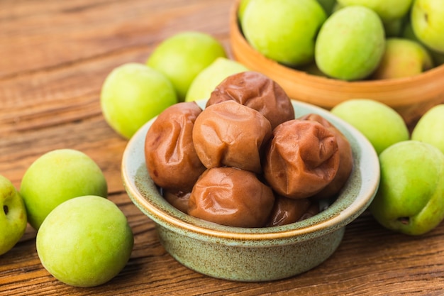 Fresh green plum and preserved green plum