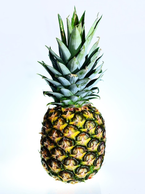 A fresh green ripe pineapple on a white background big size high resolution