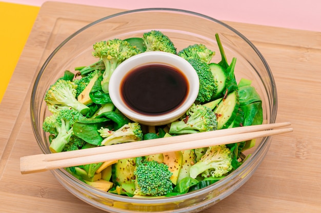 Fresh green salad of avocado broccoli spinach and cucumber for detox