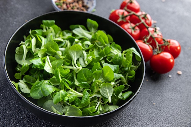 fresh green salad mache leaves healthy meal food snack on the table copy space food background 