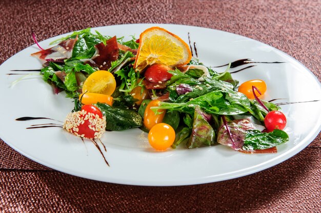 Fresh green salad with spinach,arugula,romaine and lettuce.