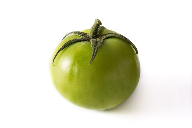 Fresh green tomato isolated