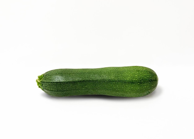 Fresh green zucchini on white background