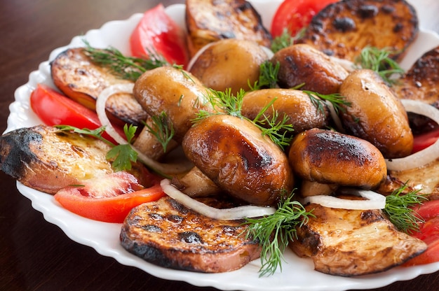 Fresh grilled vegetables in a white dish