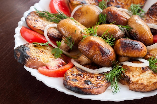 Fresh grilled vegetables in a white dish