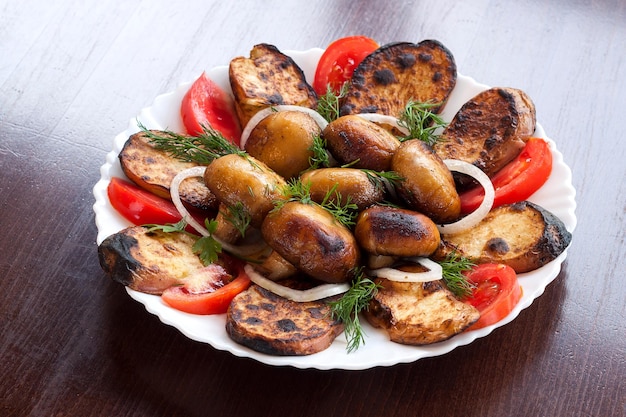 Fresh grilled vegetables in a white dish