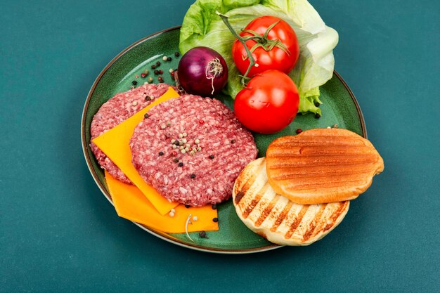 Fresh ground burger patties for cooking