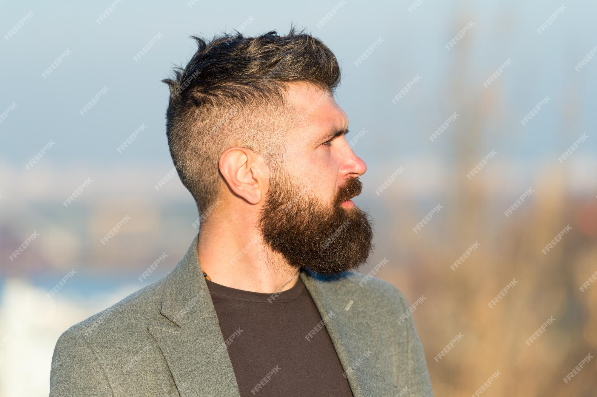 Premium Photo | Fresh haircut man bearded hipster with mustache blue sky background beard grooming guide hipster serious handsome attractive guy with long beard barber hairdresser salon guy stylish long beard Premium Photo | Fresh haircut man bearded hipster with mustache blue sky background beard grooming guide hipster serious handsome attractive guy with long beard barber hairdresser salon guy stylish long beard