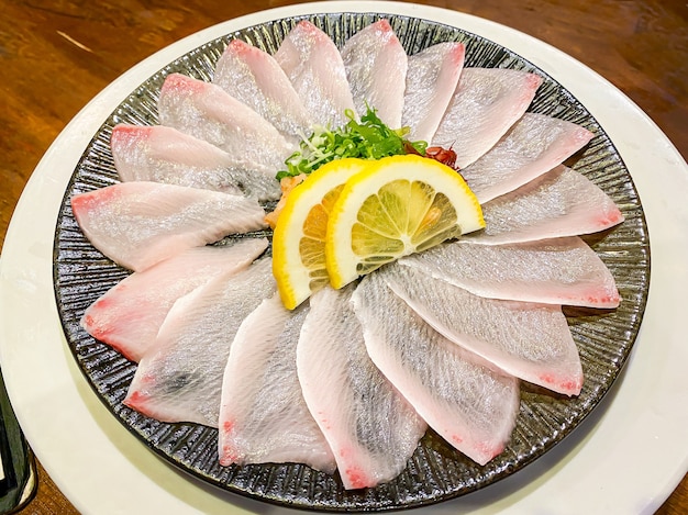 Fresh Hamaji fish sashimi served on the table