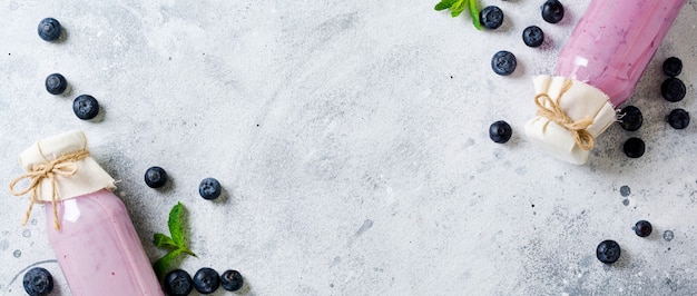 Fresh healthy blueberries smoothie berries and mint in glass jar