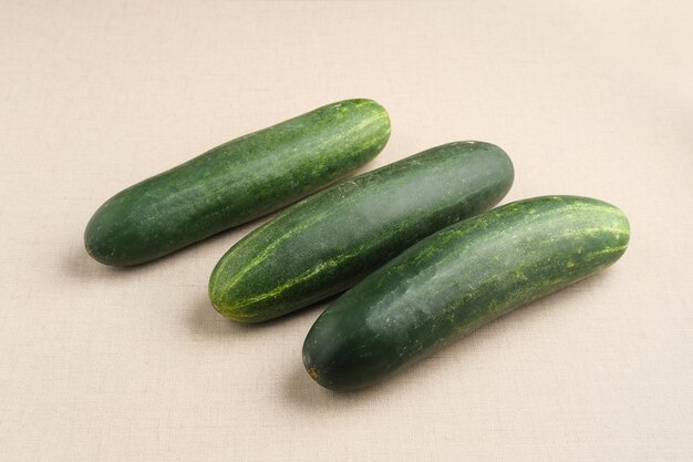 Fresh and healthy organic cucumbers served on the table Close up Selected focus