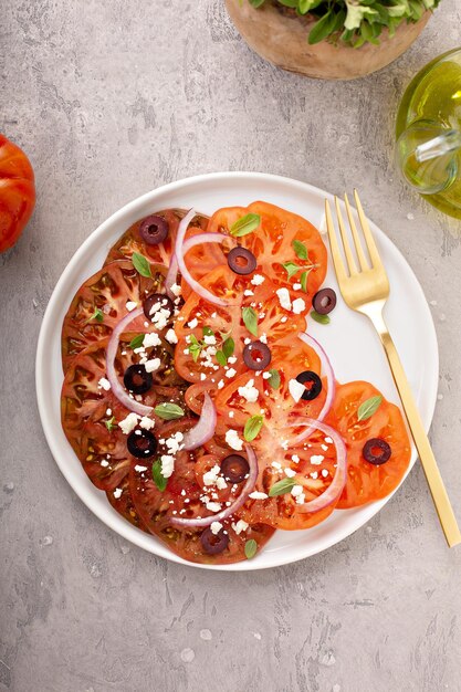 Fresh heirloom tomato carpaccio salad