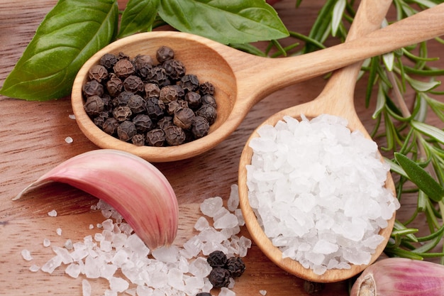 Fresh herbs and salt spoon