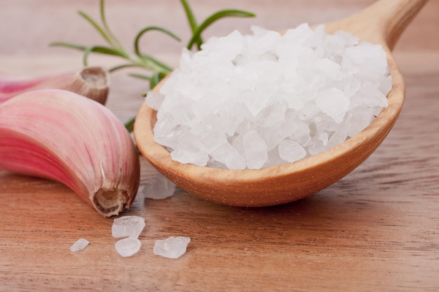 Fresh herbs and salt spoon